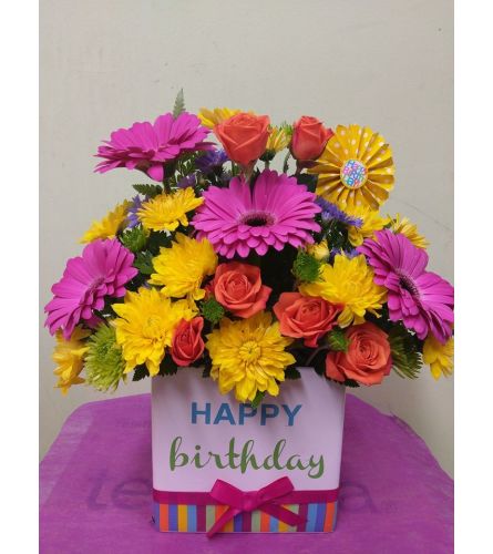 Happy Birthday. An arrangement by Avenue Flowers and Gifts.