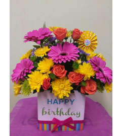 Happy Birthday. An arrangement by Avenue Flowers and Gifts.