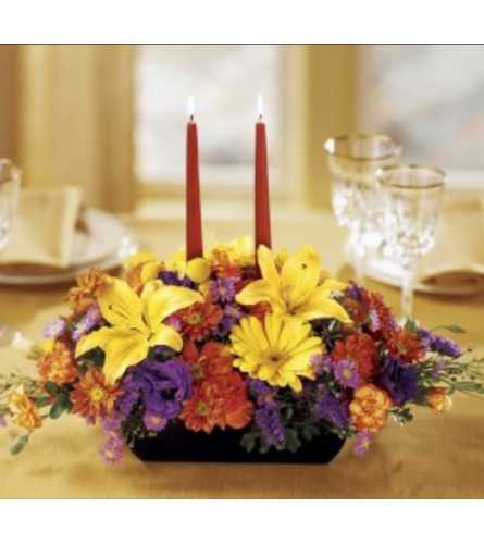 Autumn Breeze Centerpiece. An arrangement by Avenue Flowers and Gifts.