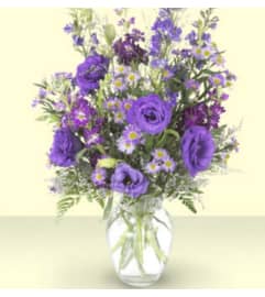 Purple Serenity. An arrangement by Avenue Flowers and Gifts.