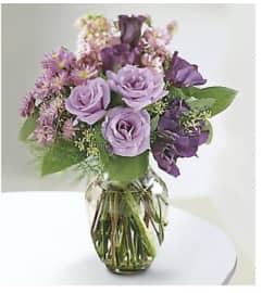 Lavender Kiss. An arrangement by Avenue Flowers and Gifts.