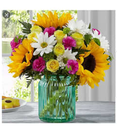 Country Charms. An arrangement by Avenue Flowers and Gifts.