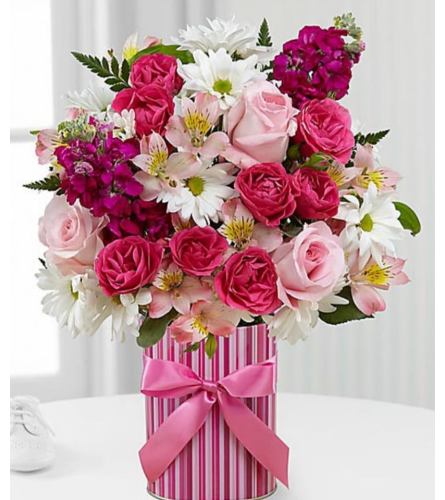 Candy Striper. An arrangement by Avenue Flowers and Gifts.