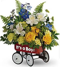 Baby Boy Wagon Garden. An arrangement by Avenue Flowers and Gifts.