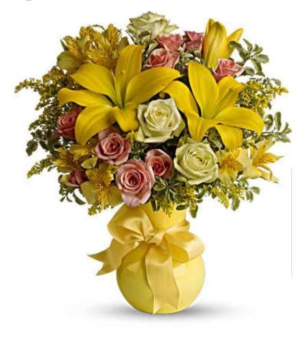 Sun and Smiles. An arrangement by Avenue Flowers and Gifts.