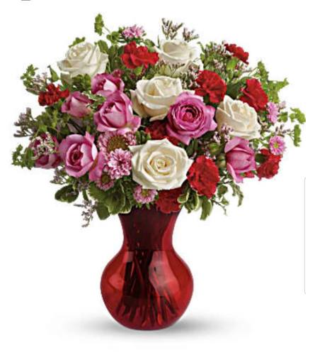 Splendid Red. An arrangement by Avenue Flowers and Gifts.