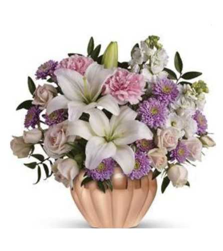 Love's Medley. An arrangement by Avenue Flowers and Gifts.