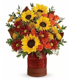 Rustic Heirloom Sunflower. An arrangement by Avenue Flowers and Gifts.