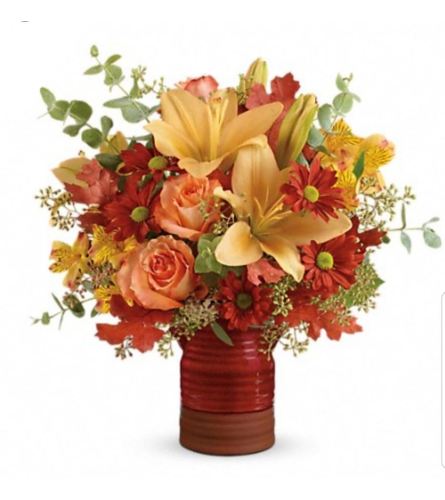 Tawny Red Autumn. An arrangement by Avenue Flowers and Gifts.