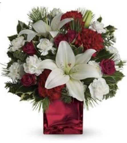 Here We Go A-Caroling. An arrangement by Avenue Flowers and Gifts.