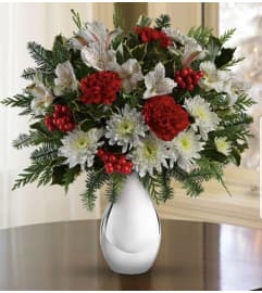 Silver and Snowflakes. An arrangement by Avenue Flowers and Gifts.