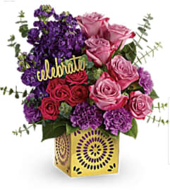 Go Celebrate. An arrangement by Avenue Flowers and Gifts.