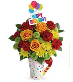 Cheers to Your Birthday Surprise. An arrangement by Avenue Flowers and Gifts.