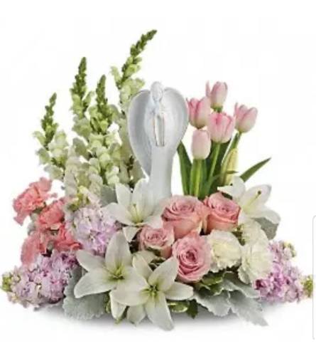 Angel in Pink Garden. An arrangement by Avenue Flowers and Gifts.