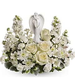 Angel in White Garden. An arrangement by Avenue Flowers and Gifts.