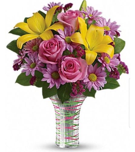 Serenade. An arrangement by Avenue Flowers and Gifts.