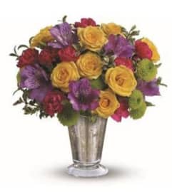 Petite and Fancy. An arrangement by Avenue Flowers and Gifts.