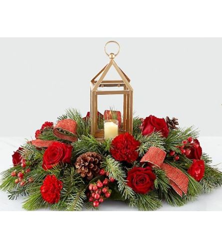 Home for Christmass. An arrangement by Avenue Flowers and Gifts.