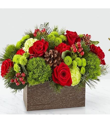 Natural Christmas Arrangement. An arrangement by Avenue Flowers and Gifts.