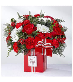 Jesus is the Gift. An arrangement by Avenue Flowers and Gifts.