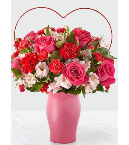 DIRECTO AL CORAZONE - Deluxe. An arrangement by Avenue Flowers and Gifts.