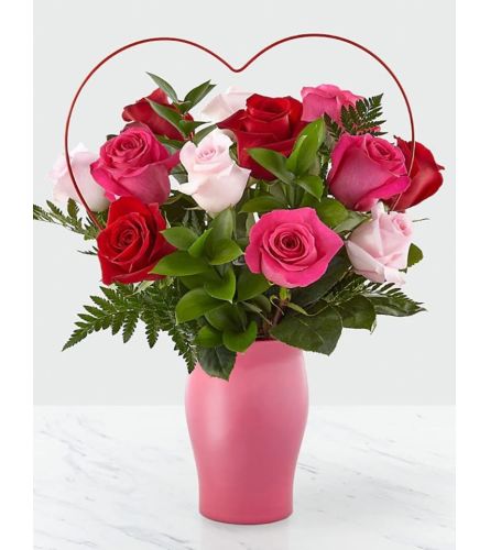 X O X O X O - Deluxe. An arrangement by Avenue Flowers and Gifts.