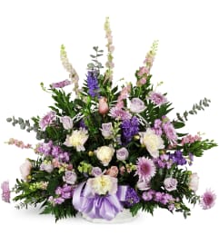 Love's Twilight Sympathy Basket™. An arrangement by Avenue Flowers and Gifts.