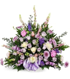 Love's Twilight Sympathy Basket™. An arrangement by Avenue Flowers and Gifts.