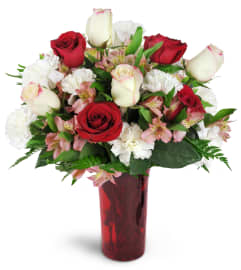 Romance of Roses™. An arrangement by Avenue Flowers and Gifts.