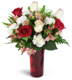 Romance of Roses™. An arrangement by Avenue Flowers and Gifts.