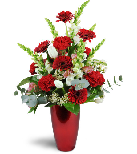 Colors of Love Vase™ - Deluxe. An arrangement by Avenue Flowers and Gifts. Red carnations, red mini Gerbera daisies, white tulips, and white...