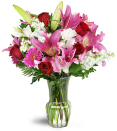 Blushing Heart Bouquet™. An arrangement by Avenue Flowers and Gifts.