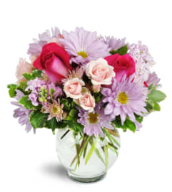 Sweet Surprise™. An arrangement by Avenue Flowers and Gifts.