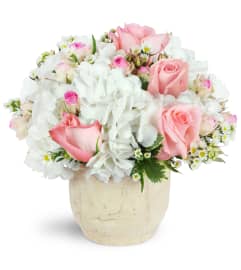 Graceful Embrace. An arrangement by Avenue Flowers and Gifts.