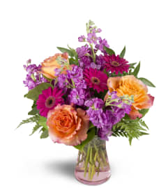 Invigorate™. An arrangement by Avenue Flowers and Gifts.