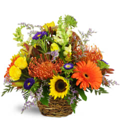 Autumn Joy Basket™. An arrangement by Avenue Flowers and Gifts.