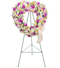 Loving Thoughts Wreath. An arrangement by Avenue Flowers and Gifts.
