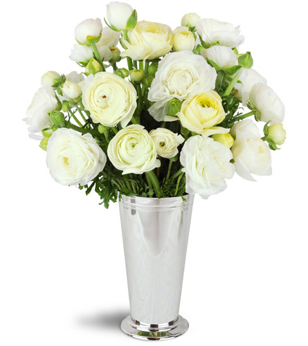 Vintage Romance™. An arrangement by Avenue Flowers and Gifts. Over two dozen stems of white ranunculus are fabulously arranged in a...