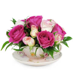 Teacup of Roses. An arrangement by Avenue Flowers and Gifts.