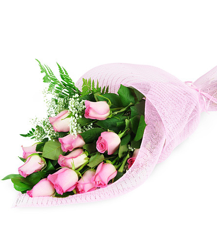 Perfect Wrapped Long-Stemmed Pink Roses. An arrangement by Avenue Flowers and Gifts. One dozen pink roses are wrapped in pink paper and ribbon to...
