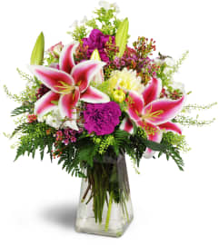 Spring’s Bounty Bouquet™. An arrangement by Avenue Flowers and Gifts.