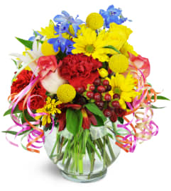 Celebrating You!™. An arrangement by Avenue Flowers and Gifts.