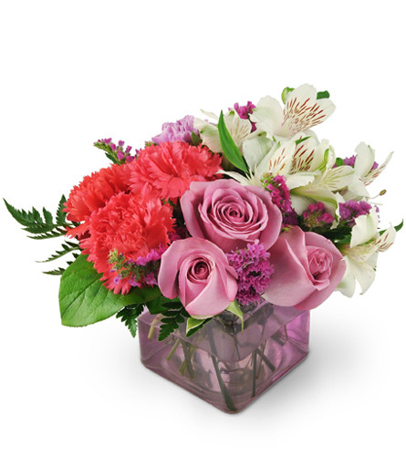 Lovely Way Bouquet™. An arrangement by Avenue Flowers and Gifts. Roses, alstroemeria, carnations, statice, and more are delightfully arranged in a...