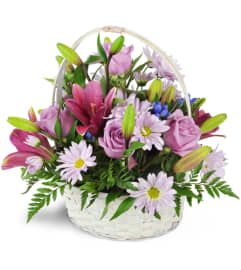 Basket Full of Dreams™. An arrangement by Avenue Flowers and Gifts.