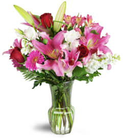 Blushing Heart Bouquet™. An arrangement by Avenue Flowers and Gifts.
