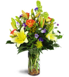 Garden Splendor Bouquet™. An arrangement by Avenue Flowers and Gifts.