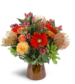 Energetic Orange™. An arrangement by Avenue Flowers and Gifts.
