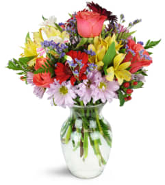 Brilliant Surprise™. An arrangement by Avenue Flowers and Gifts.