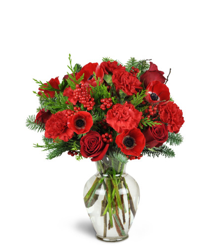 Merry Making Bouquet™ - Deluxe. An arrangement by Avenue Flowers and Gifts. Surprise them with a bouquet of red roses, carnations, anemones, ilex...