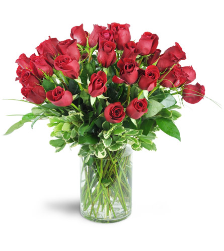 Unstoppable Romance™. An arrangement by Avenue Flowers and Gifts. Give your one and only four dozen red roses exquisitely arranged in a glass vase..